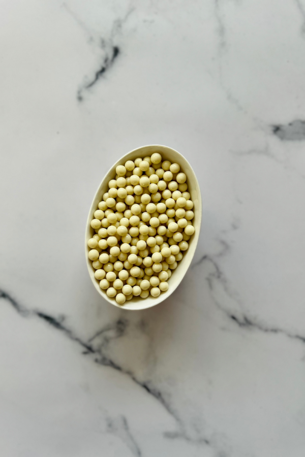 Valrhona Opalys kuvertüüri pärlid, 100 g